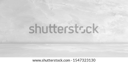 White marble flooring for interior decoration, used as studio background wall to display your products. Royalty-Free Stock Photo #1547323130