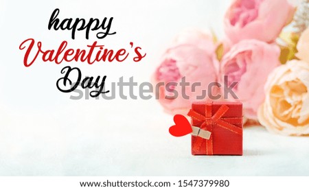 Happy Valentine's day concept. Greeting card with gift box, heart and pink flowers. gentle lovely image. 