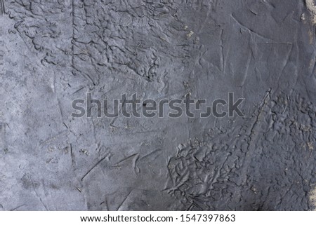 gray concrete background with bumps, marks from trowel