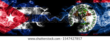 Cuba, Cuban vs Belize, Belizean smoky mystic flags placed side by side. Thick colored silky travel abstract smokes banners 