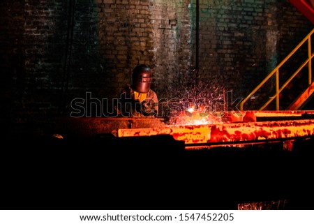 Iron/steel Cutting by a blow torch picture taken at a steel factory