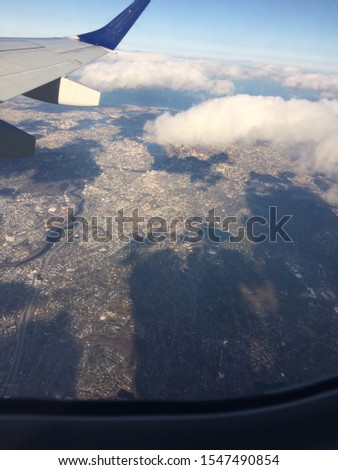 City overview from plane side angle