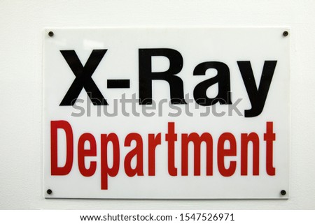 mounted sign says xray department