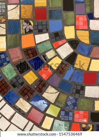 Colorful mosaic tiles texture. Patchwork chipped tiles in vintage style.