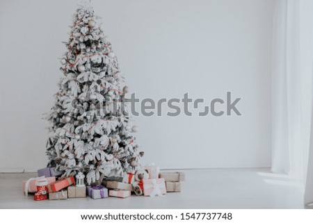 Christmas tree with presents new year white scenery