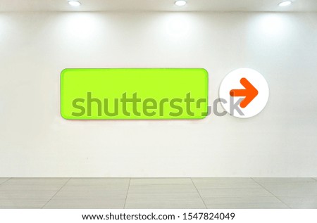 Mock up. Signboard of store, shop. Green banner on white wall.                               