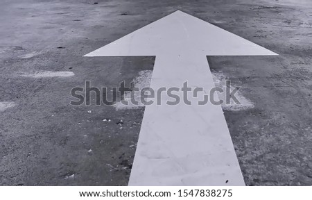 Road surface, white one way sign