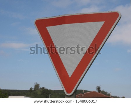 Regulatory signs, give way or yield traffic sign