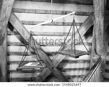 old weight used in weigh mills. Black and white photo
