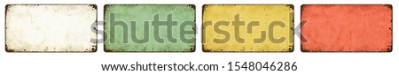 Four empty vintage tin signs on a white background Royalty-Free Stock Photo #1548046286