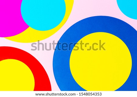 Texture background of fashion papers in memphis geometry style. Yellow, blue, magenta, pink colors. Top view, flat lay