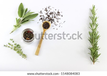 Organic and minimalistic flat lay of herbs and tea for a natural wellness background, top view. Self Care