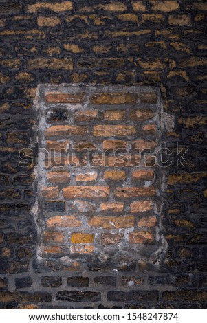 Old stone wall background. Background with Old Vintage Dirty Brick Wall, Texture. Shabby Building Facade