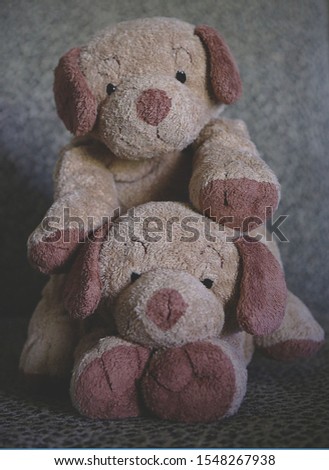 Teddy bears posing for pictures.