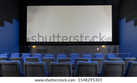 mocap , big screen in the role of a Billboard. white color cinema screen for your advertising, copy space advertising layout. watch a movie, the beginning of the session, the film and fireclay. Royalty-Free Stock Photo #1548295301