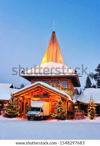 Santa Office and Christmas trees at Santa Claus Village, Rovaniemi, Lapland, Finland, on Arctic Circle in winter.