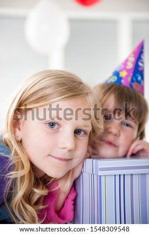 Boys and girls enjoying birthday party