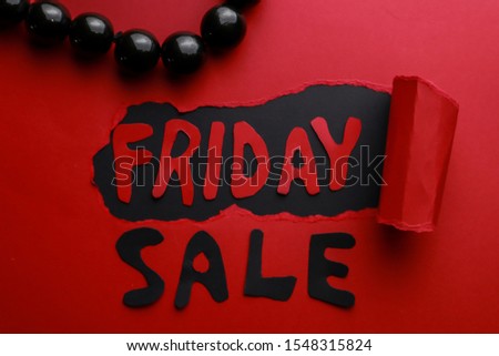 Black Friday shopping sale concept. Sign BLACK FRIDAY on color background