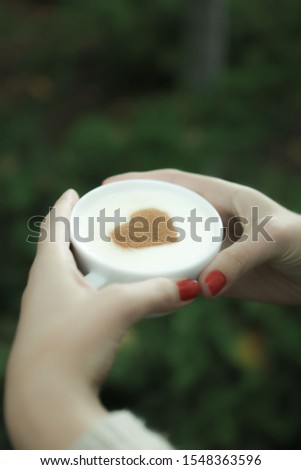 Delicious hot coffee cup on table