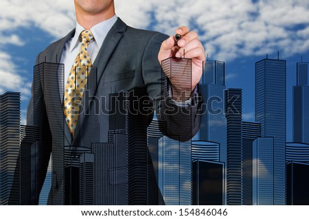 business man drawing buildings