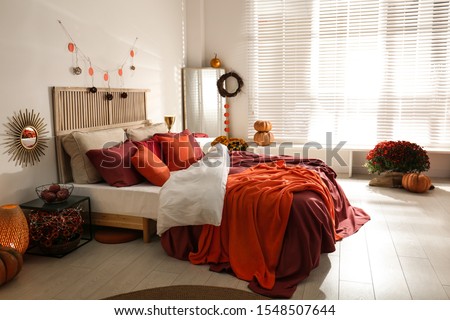Cozy bedroom interior inspired by autumn colors