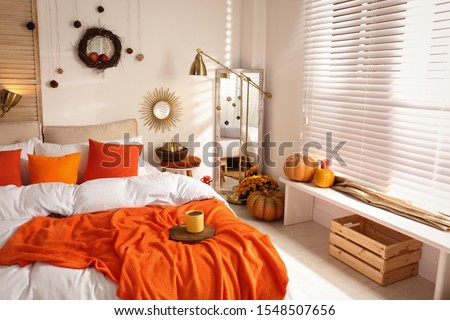Cozy bedroom interior inspired by autumn colors