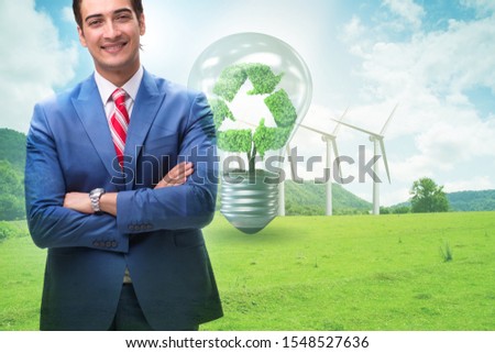 Green energy anc ecology concept with businessman