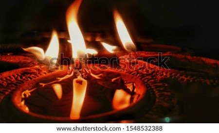 this picture was taken during DIWALI festival. It represents an oil lamp which represents happiness. 