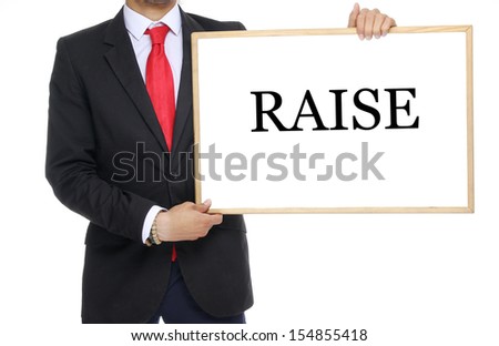 Businessman holding a white board