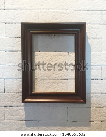 blank picture frame on the wall