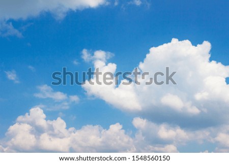Blue sky view image White clouds, horizontal image orientation, free space for text