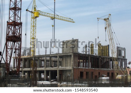 construction tower crane on a building construction