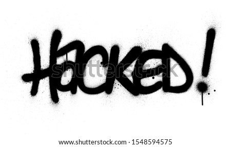 graffiti hacked word sprayed in black over white