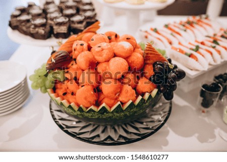Wedding decorated dessert table in a restaurant