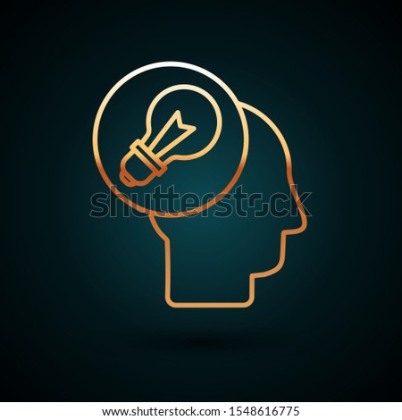 Gold line Human head with lamp bulb icon isolated on dark blue background.  Vector Illustration