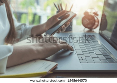 Young women working with discuss customer and using computer laptop for using design or creative  to drawing Draw clothes design. freelance at work concept.