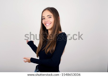 Young beautiful caucasian businesswoman over isolated background Inviting to enter smiling natural with open hands. Welcome sign.