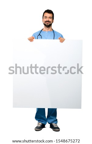 Full-length shot of Surgeon doctor man holding an empty placard over isolated white background
