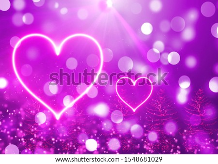 Bright heart shape on the bokeh background and rays coming from above۔ You can also use it for Christmas and New Year's greetings