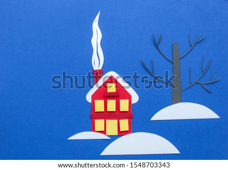 Paper art, cut, handmade 3d illustration. Red paper house with yellow window. Winter nature landscape. House on bank under snow. Countryside rural scene. Cartoon outdoors Illustration. Blue background