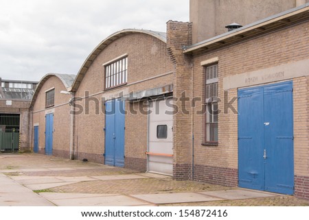 Exterior of an old but colorful factory