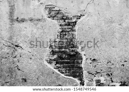Black  and Grey  Brick  Cement Concrete  Wall  Old dirty cracked    horizontal  Masonry surface construction  for wallpaper  background  Textures (close up )