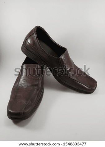 Brown shoes with white background