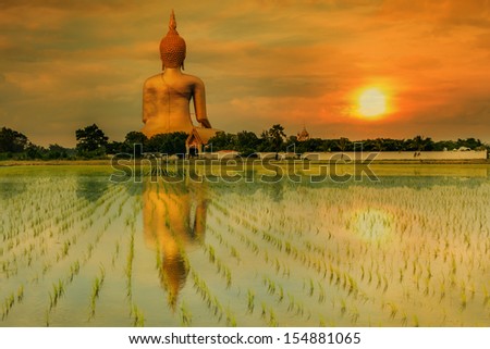 Big buddha statue in sunset at Angthong,Thailand 