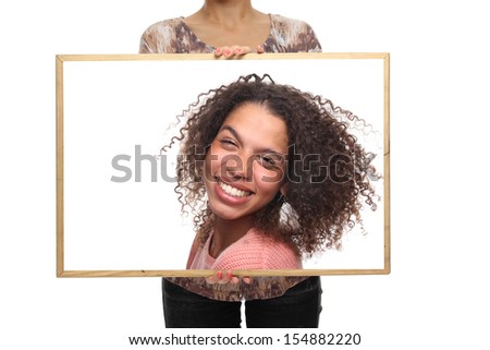 Human holding a blackboard or photo frame