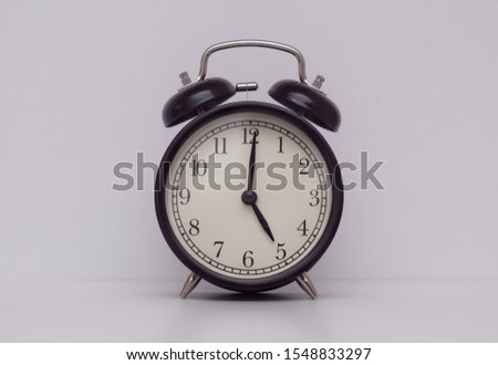 Classic watch bell show at 5 o'clock with isolated white background.