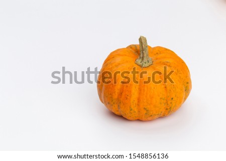 Creative Top view flat lay autumn composition. Frame made of pumpkins color paper background copy space. Template fall harvest thanksgiving halloween anniversary invitation cards.