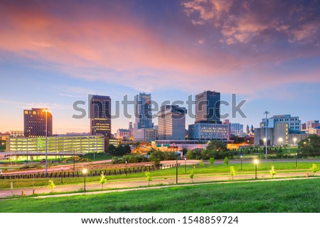 Akron, Ohio, USA downtown skyline at dusk. Royalty-Free Stock Photo #1548859724