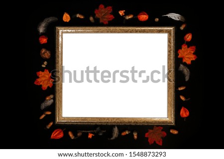 Autumn background with red maple leaves, acorns and physalis. Layout for seasonal offers and holiday card, top view. Mock up. Black background