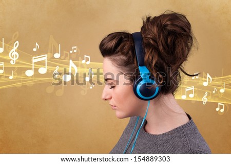 Pretty young woman listening to music, notes concept
